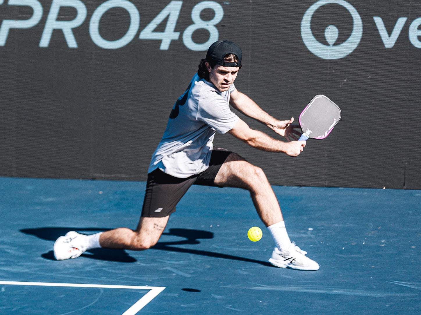 Warping Point player competing in a pickleball match